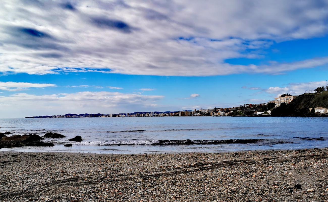 Фото Playa de Torremuelle с серый песок поверхностью