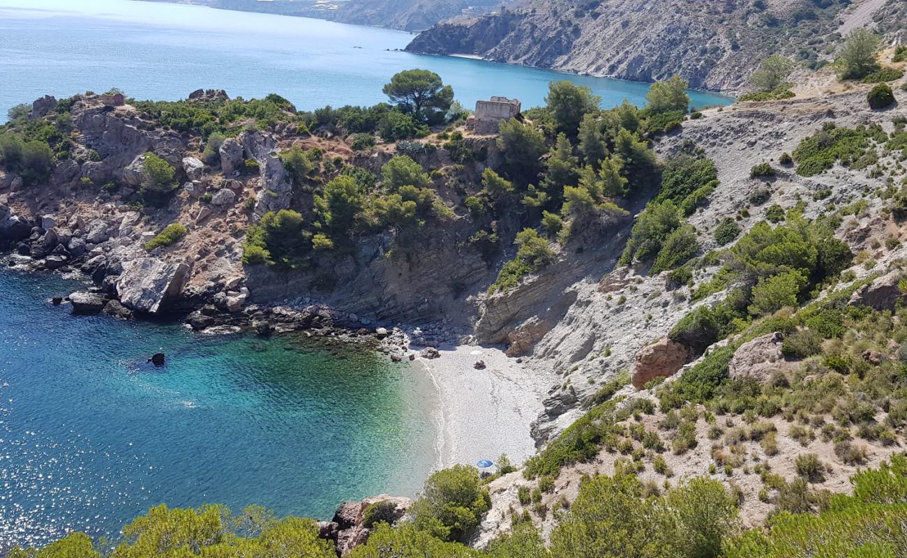 Фото La Caleta beach с белая чистая галька поверхностью