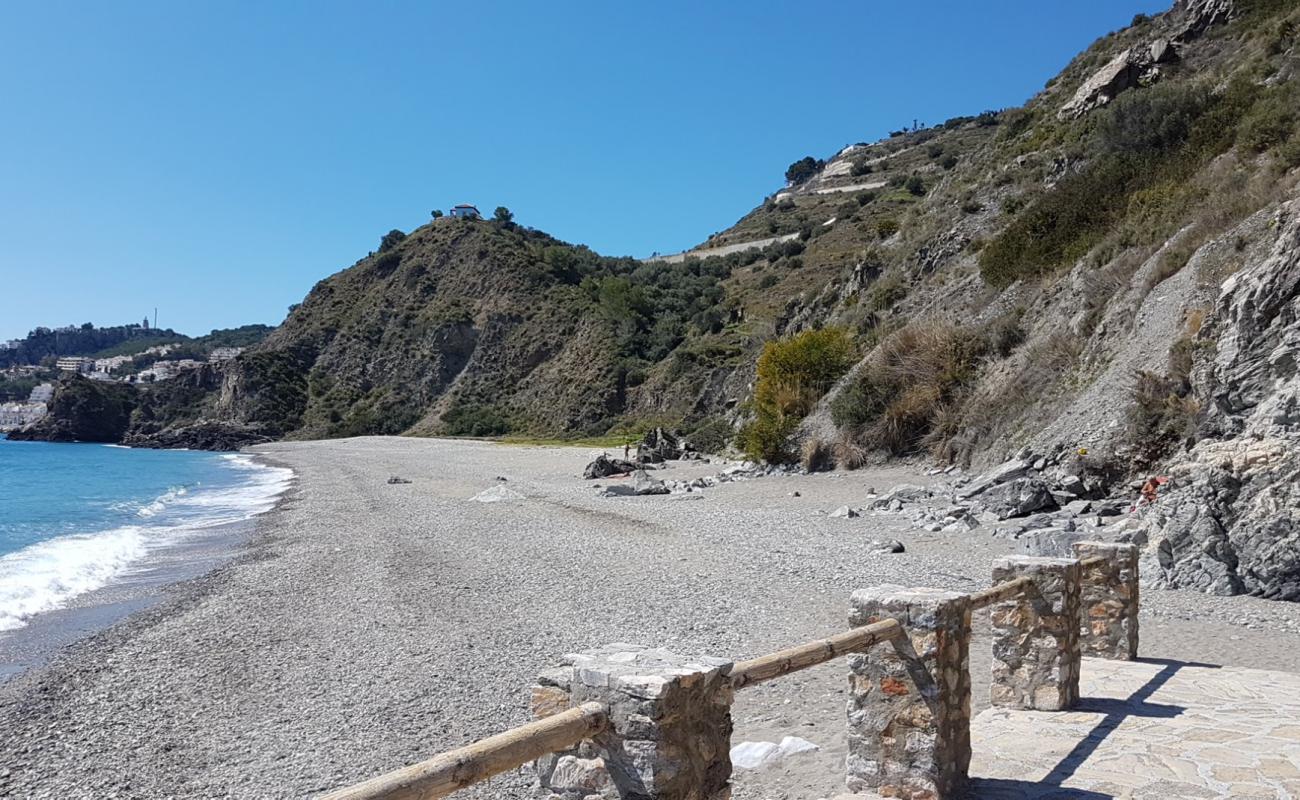 Фото Playa el Muerto с серая чистая галька поверхностью