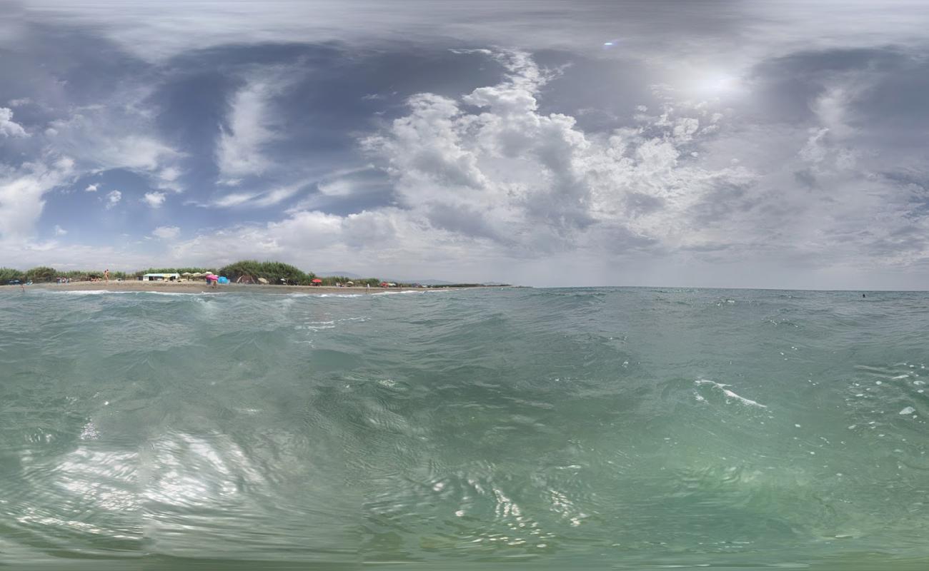 Фото Playa Cabo Gilla с серый ракушечник поверхностью