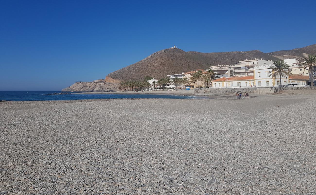 Фото Playa Castell del Ferro с серая чистая галька поверхностью