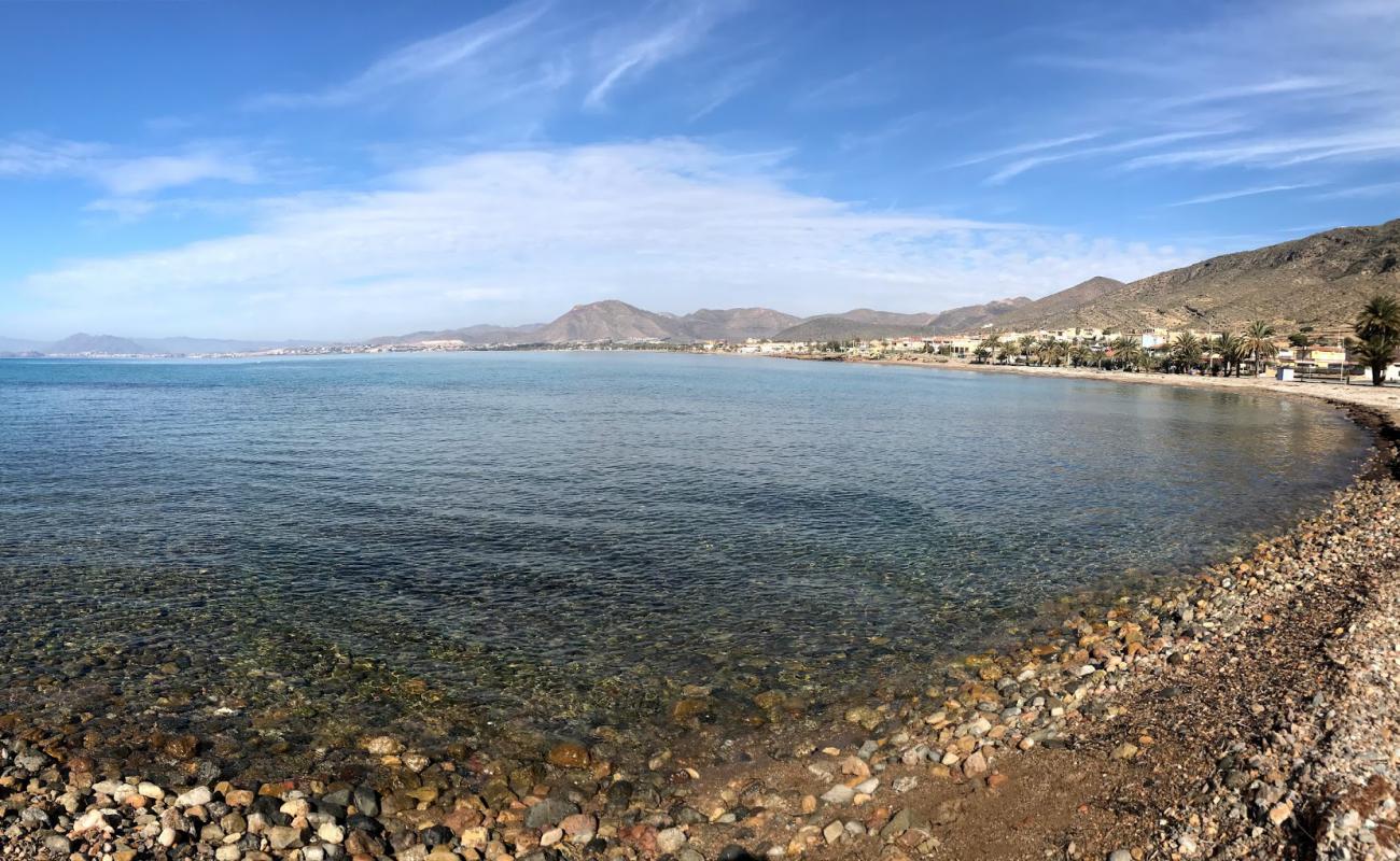 Фото Playa de la Chapineta с серая чистая галька поверхностью