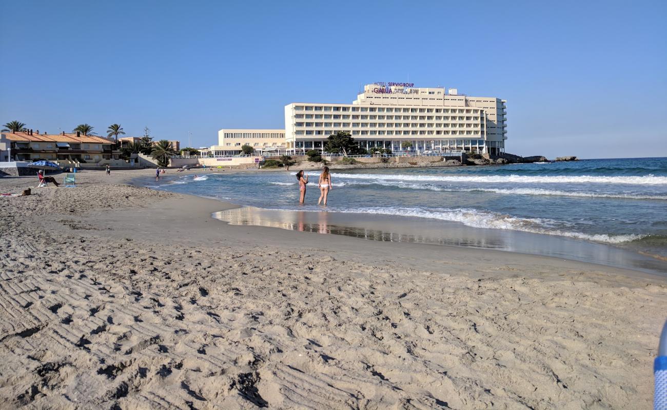 Фото Playa de Galua с светлый песок поверхностью