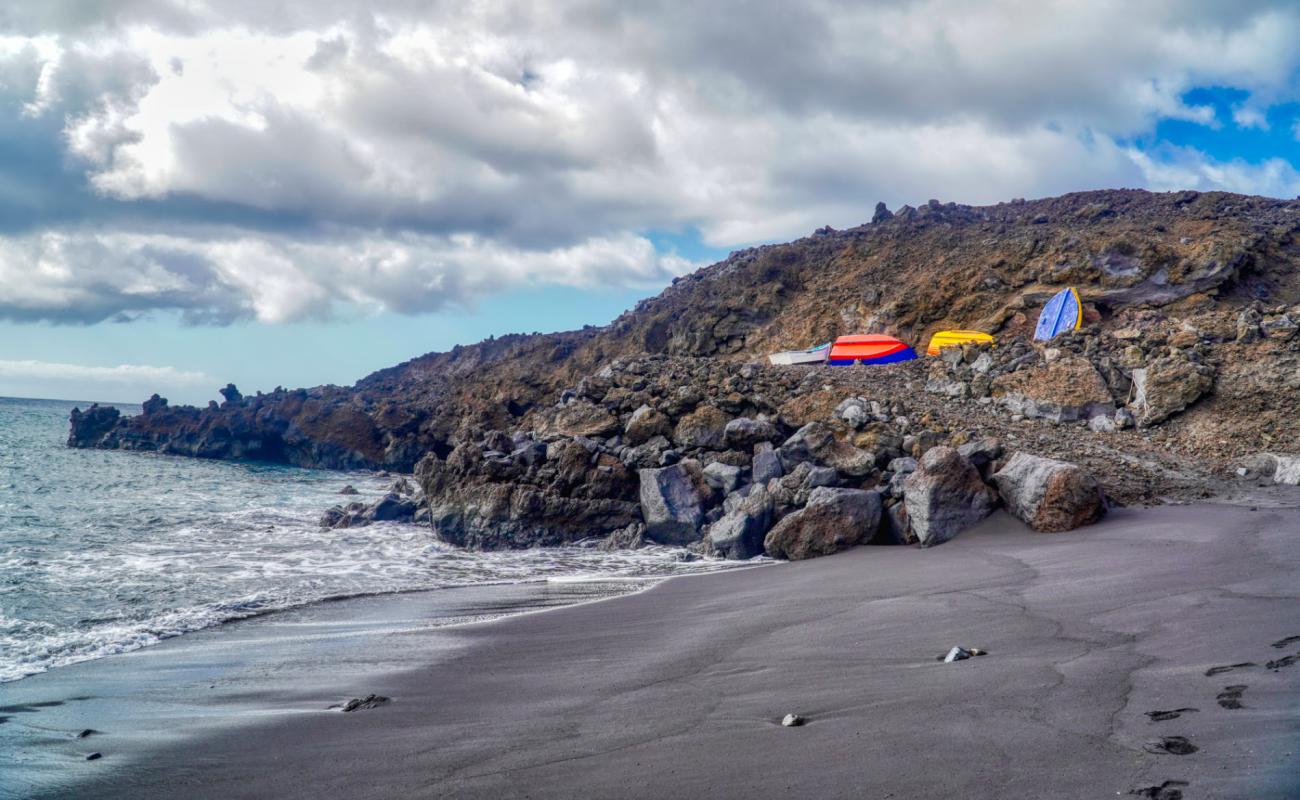 Фото Playa de Maschalani с черный песок поверхностью