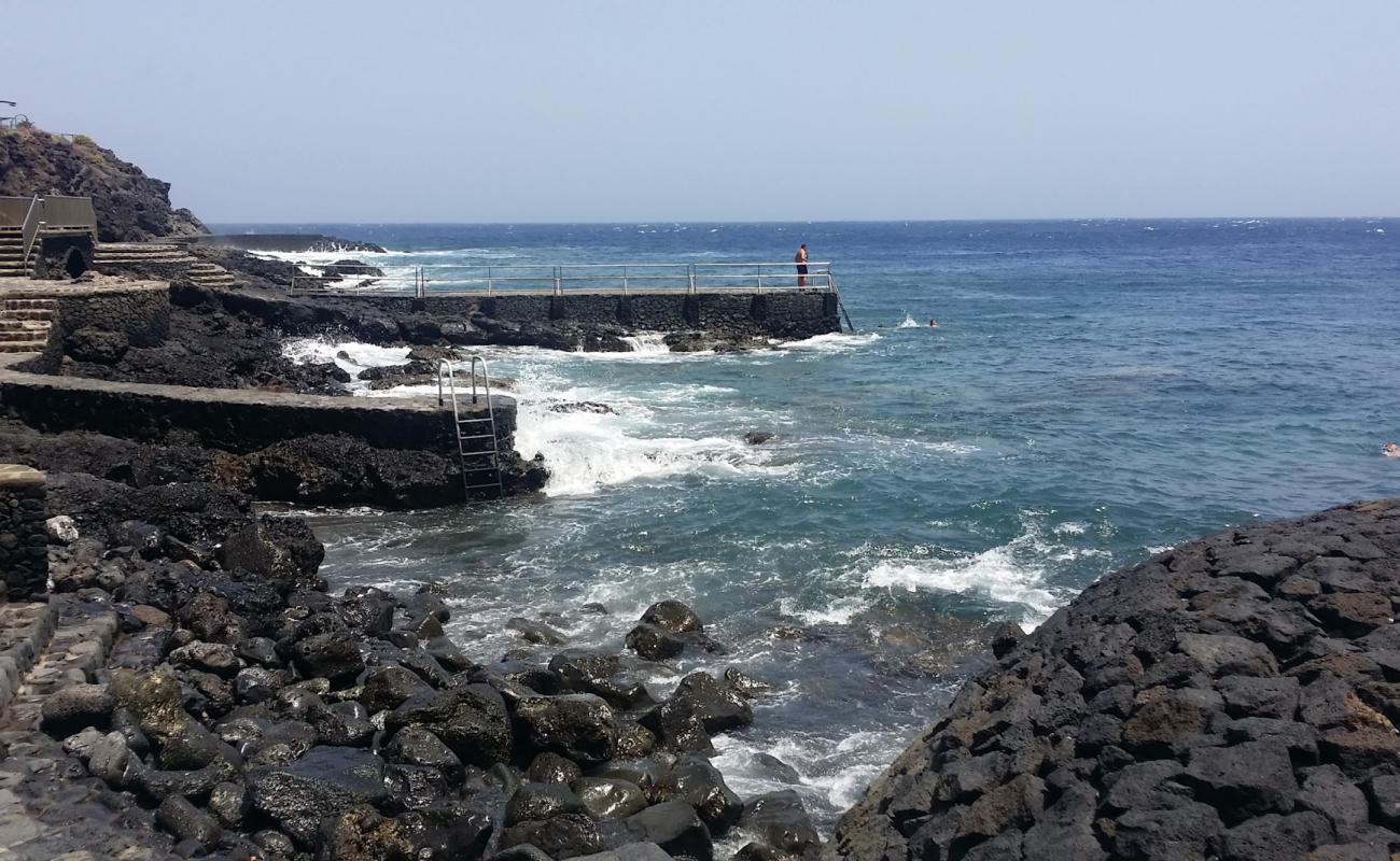 Фото Playa de La Caleta с бетон поверхностью