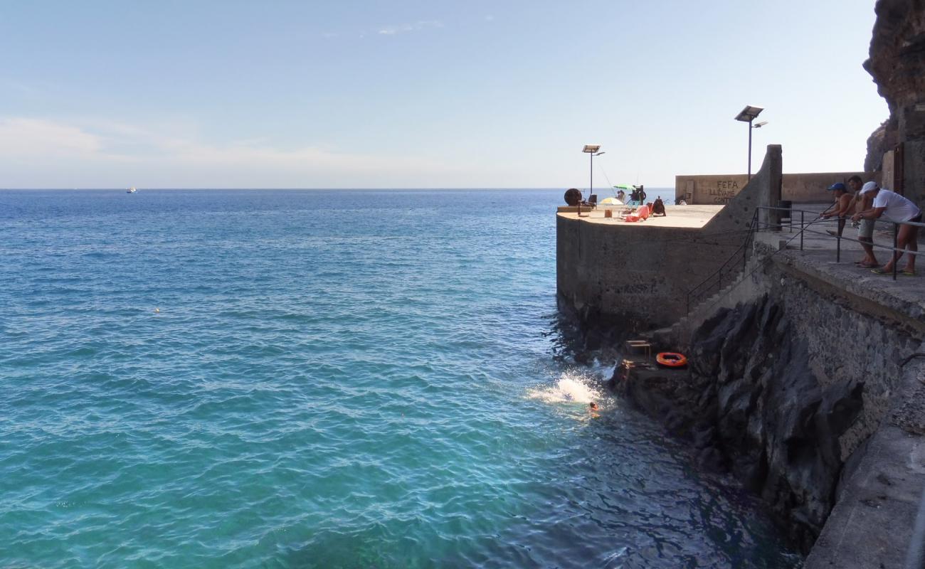 Фото Playa de la Rajita с бетон поверхностью