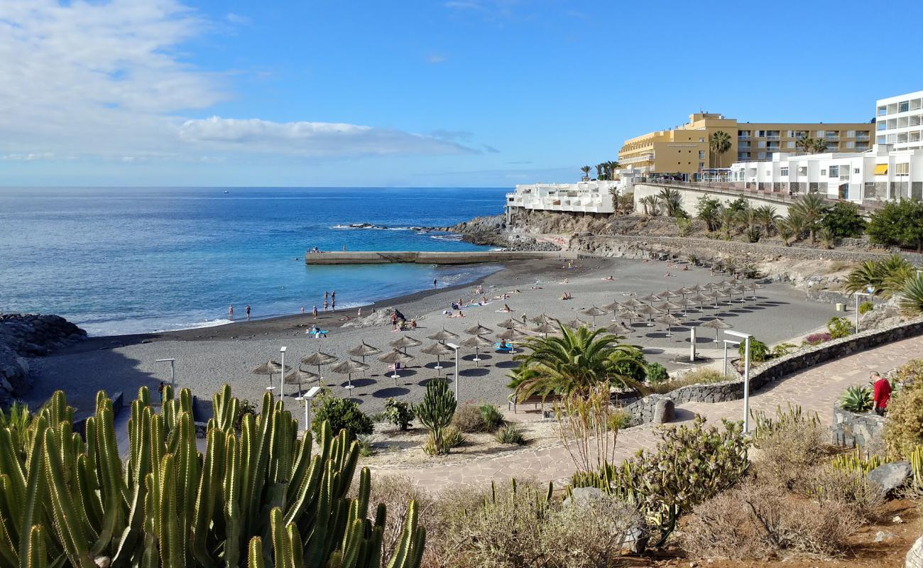 Фото Playa de Ajabo с песок с галькой поверхностью