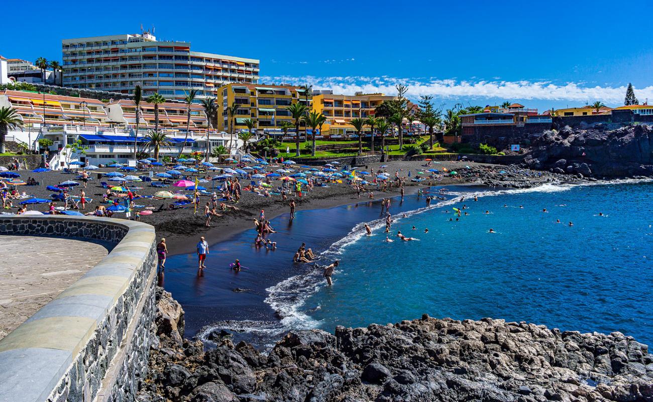 Фото Playa de la Arena с серый песок поверхностью