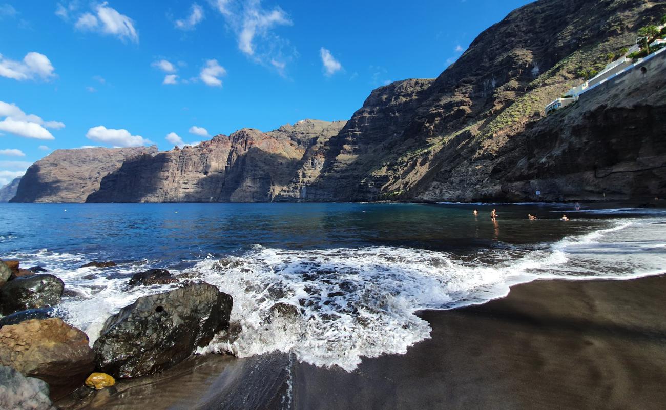 Фото Playa de los Gigantes с серый песок поверхностью