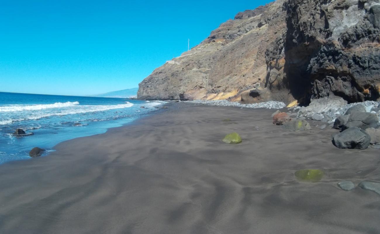 Фото Playa El Llano с серый песок поверхностью