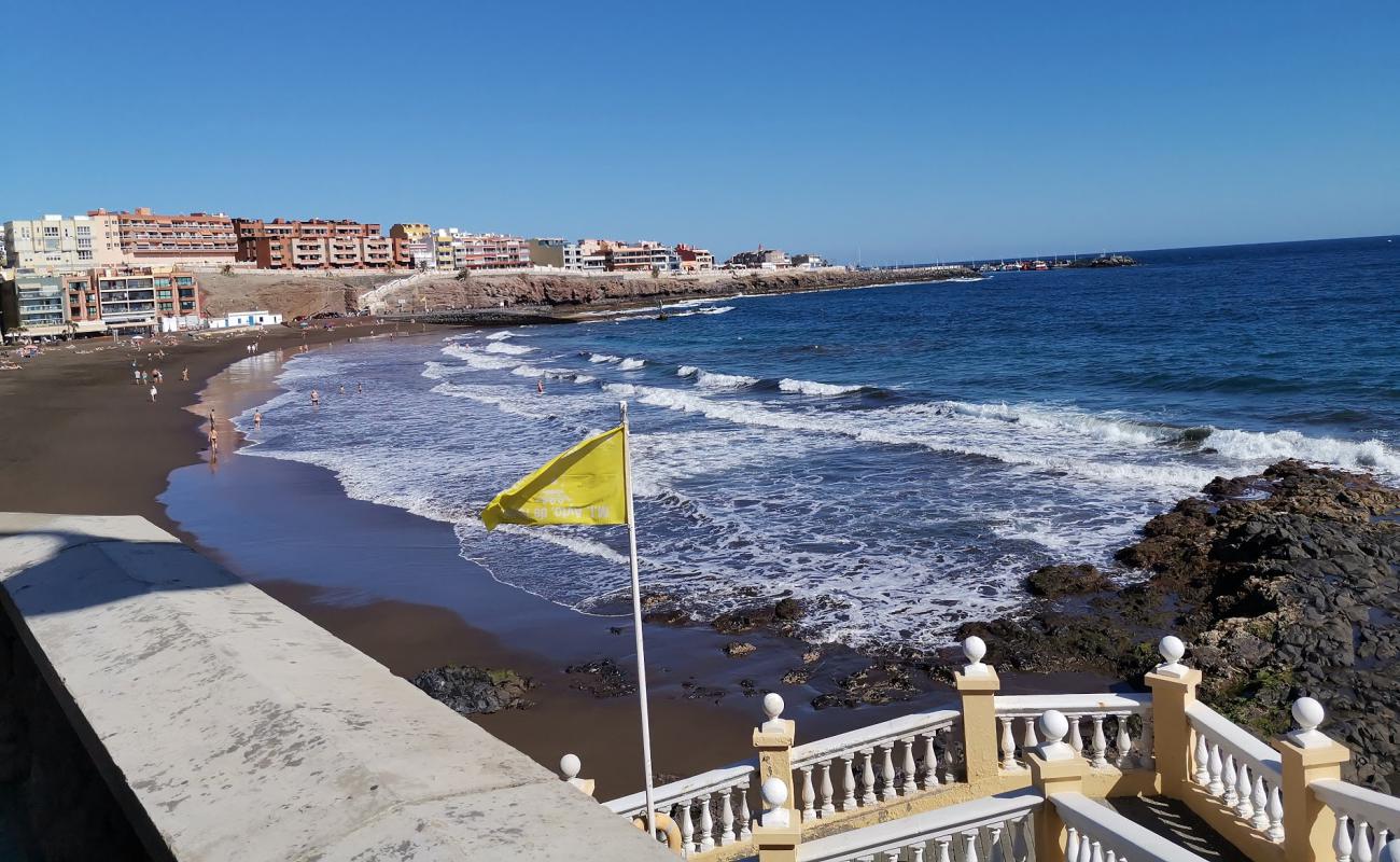 Фото Playa de Melenara с серый песок поверхностью