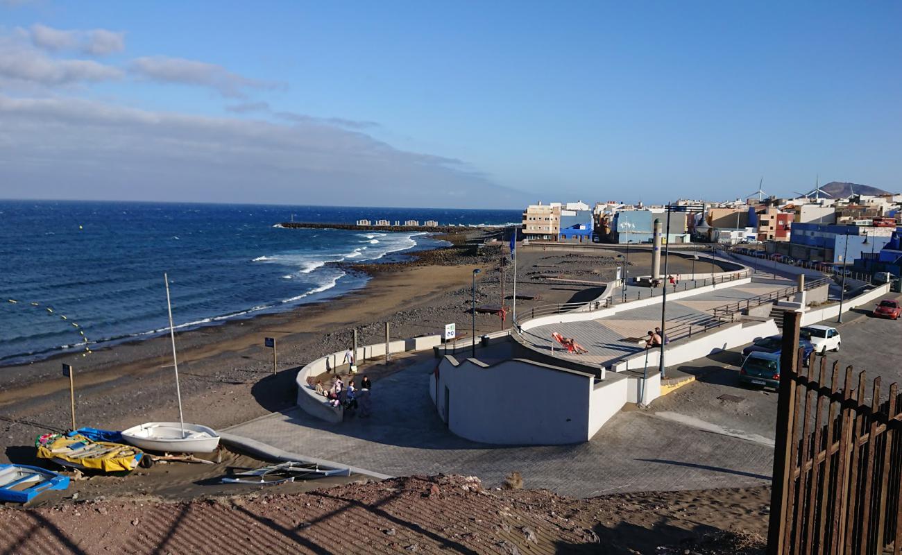 Фото Playa El Burrero с песок с галькой поверхностью