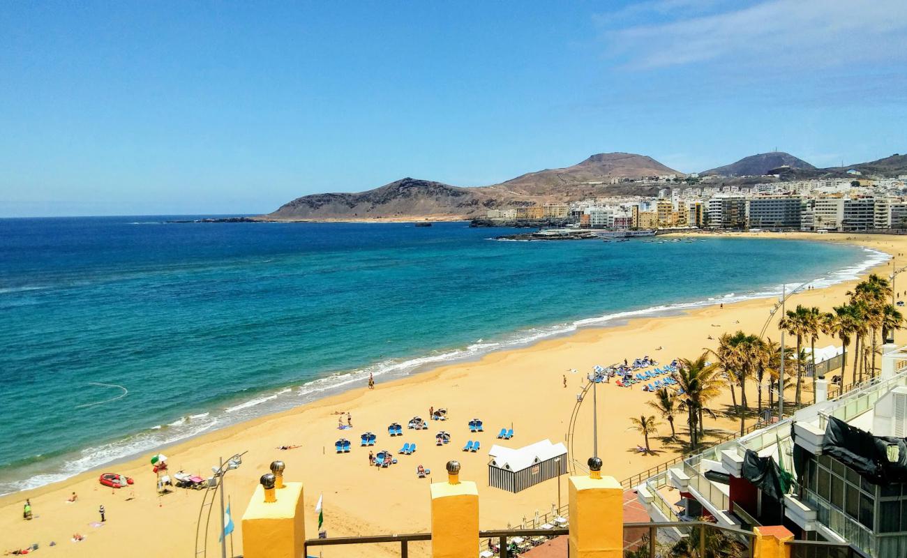 Фото Playa de Las Canteras с золотистый песок поверхностью