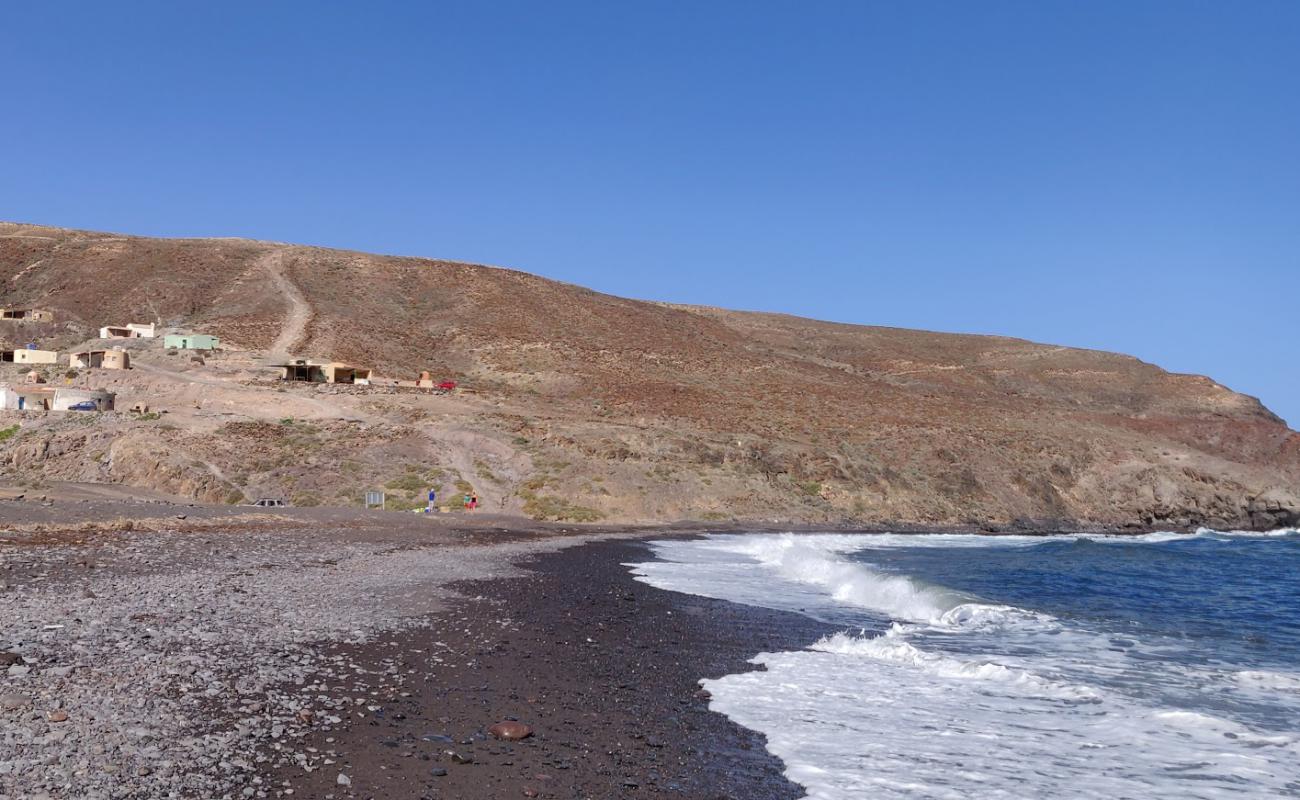 Фото Playa de Gran Valle с песок с галькой поверхностью