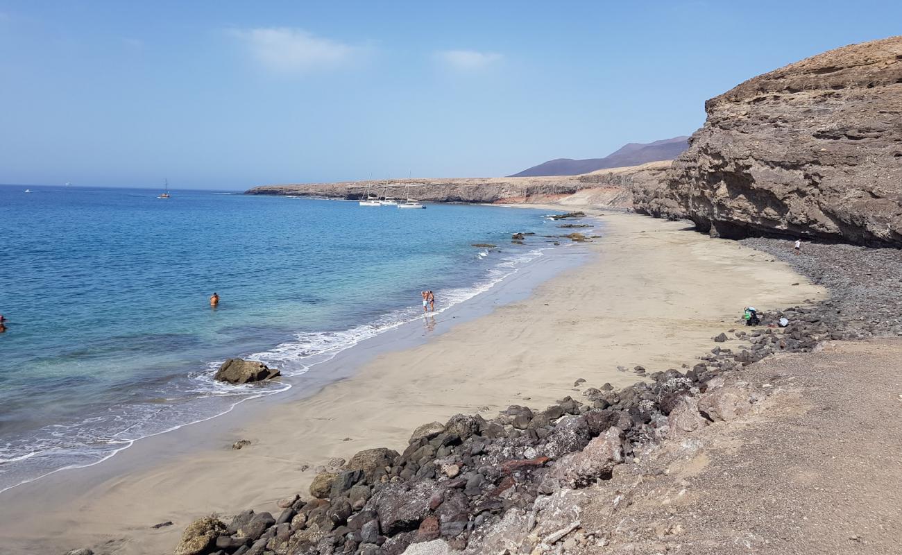 Фото Playa Las Coloradas с золотистый песок поверхностью