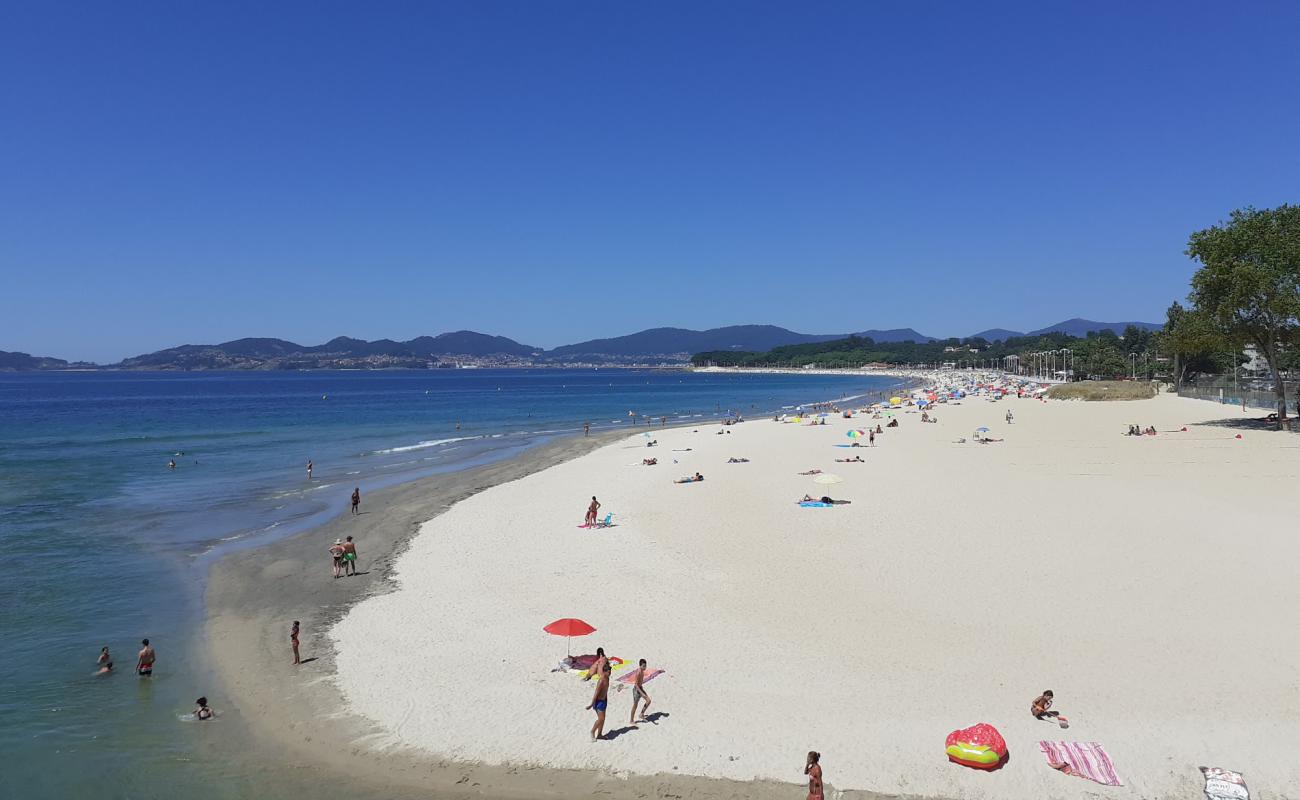 Фото Playa de Samil с золотистый песок поверхностью