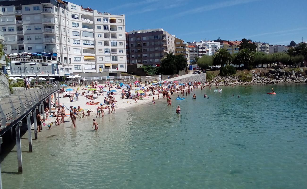 Фото Playa da Panadeira с золотистый песок поверхностью