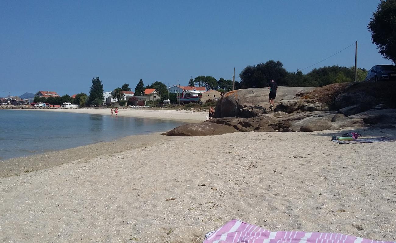 Фото Lavaxeira beach с белый песок поверхностью