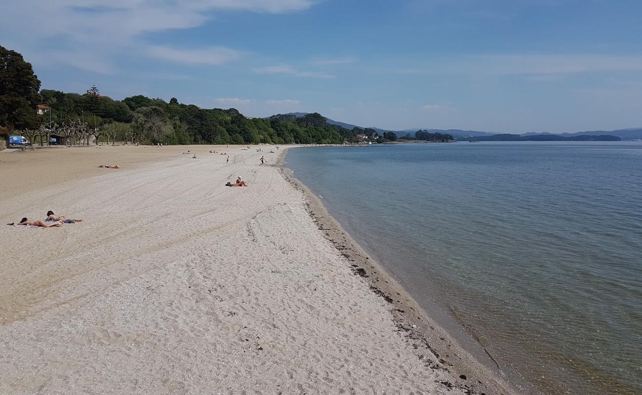 Фото Tanxil beach с светлый песок поверхностью