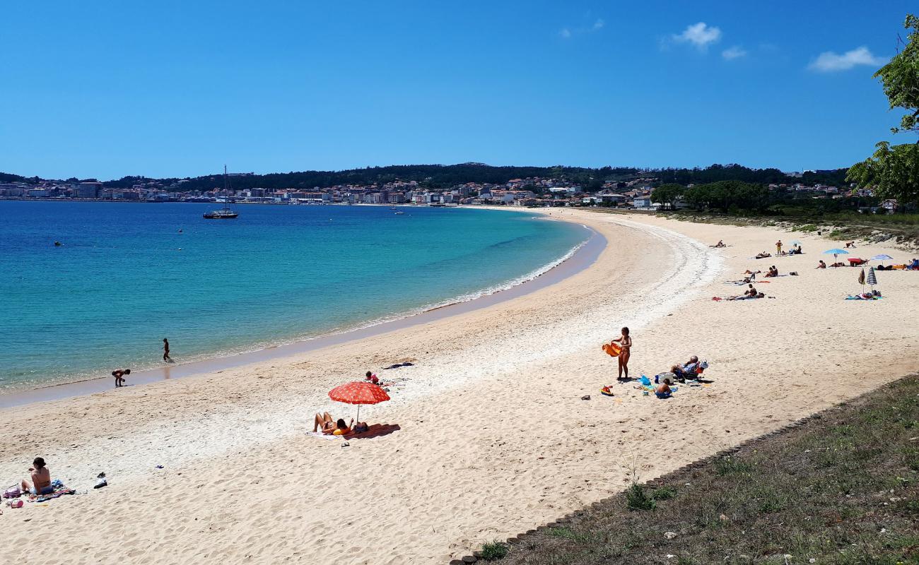 Фото Coroso beach с светлый песок поверхностью