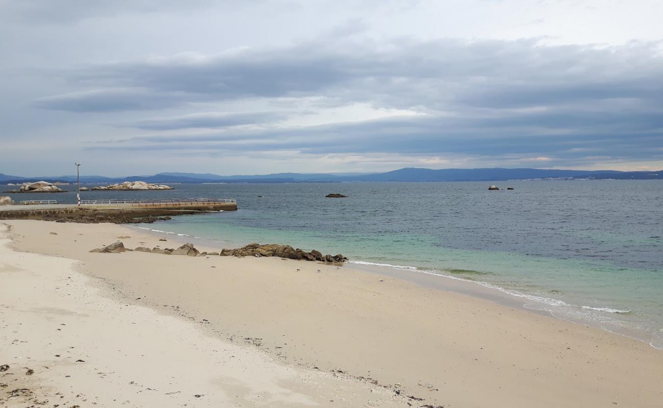 Фото Ameixida beach с светлый песок поверхностью