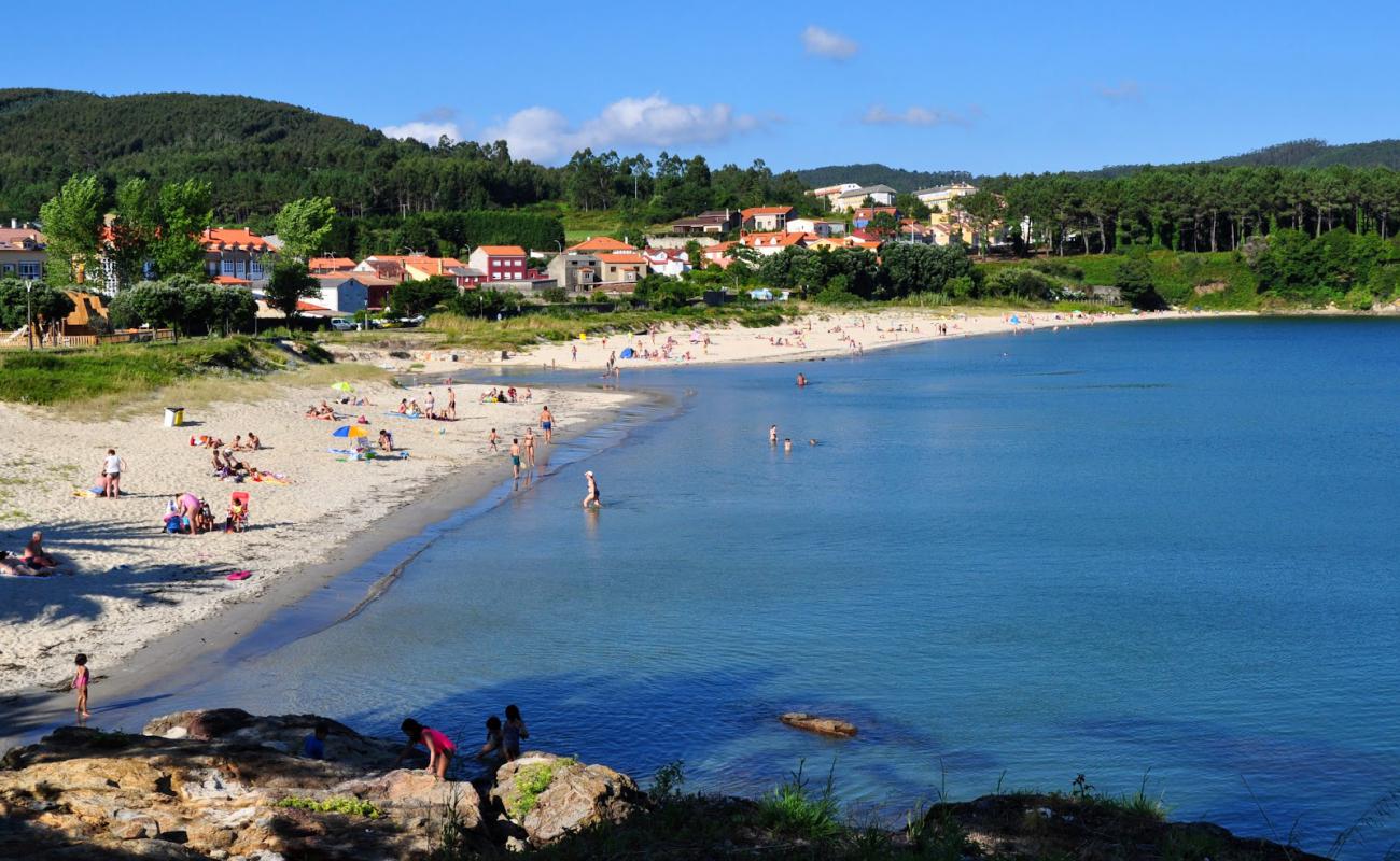 Фото Praia de Sardineiro с белый песок поверхностью