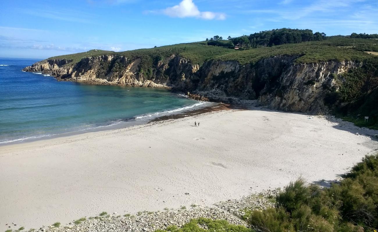 Фото Praia de Beo с белый песок поверхностью