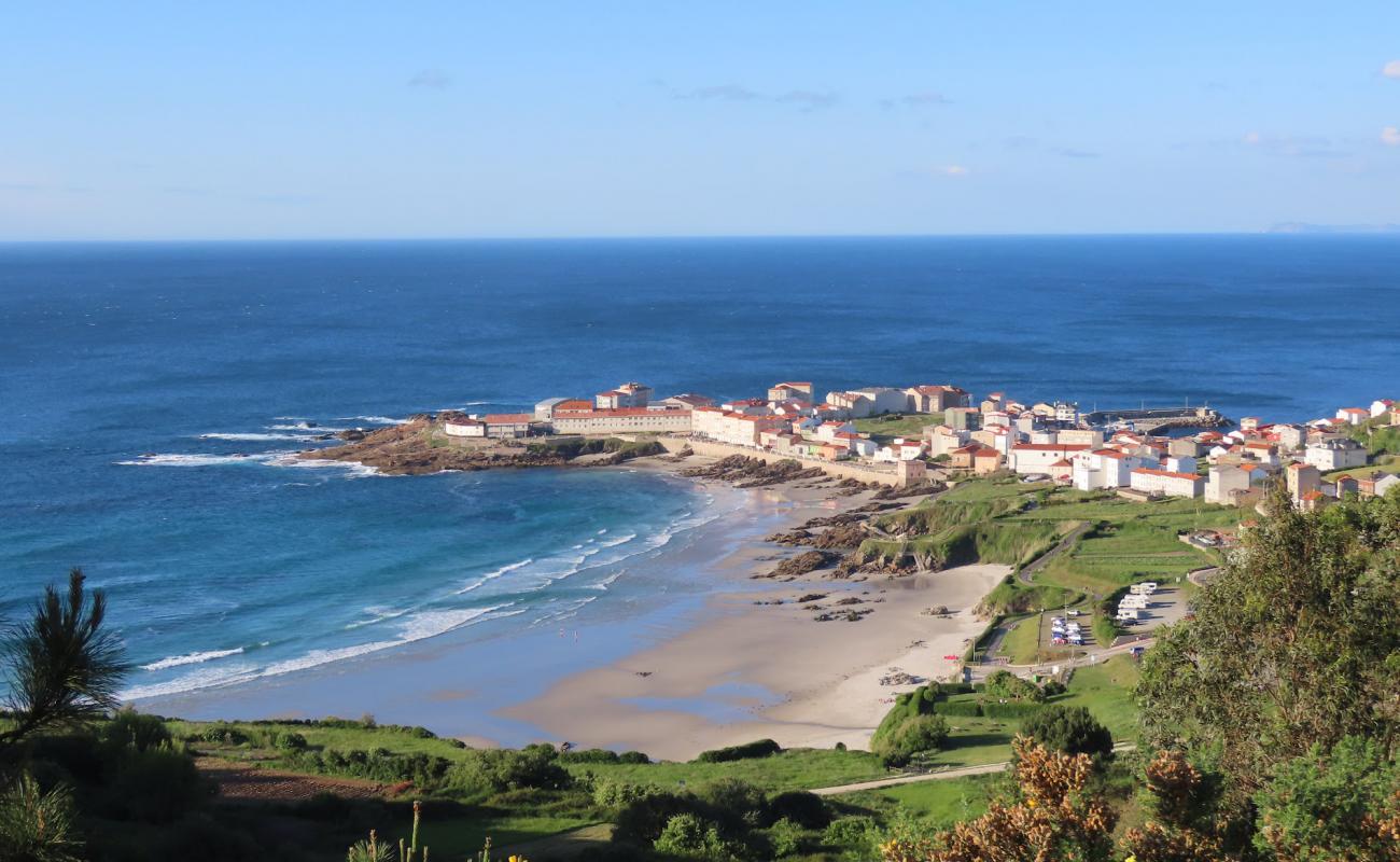 Фото Praia de Caion с белый чистый песок поверхностью