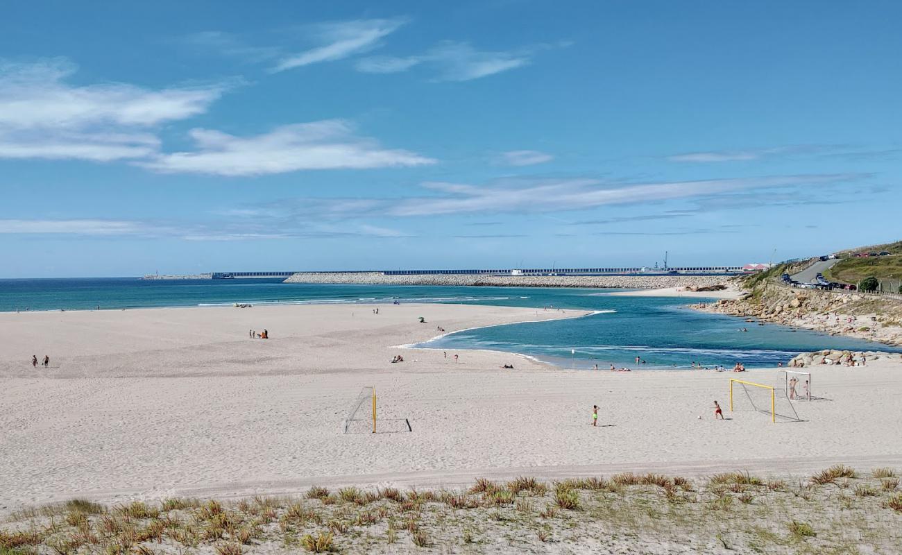 Фото Praia de Sabon с белый песок поверхностью