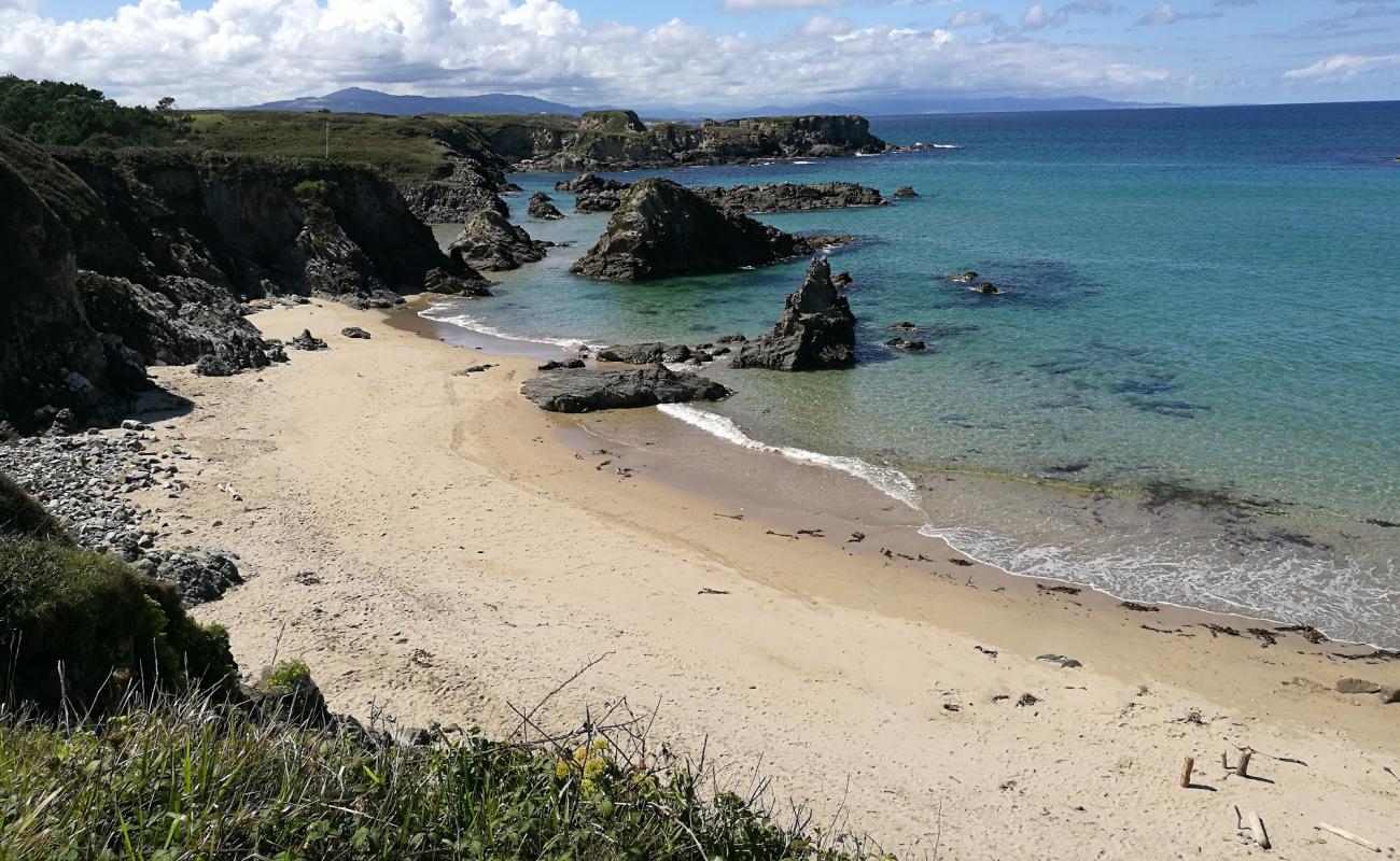 Фото Playa de la Paloma с белый чистый песок поверхностью