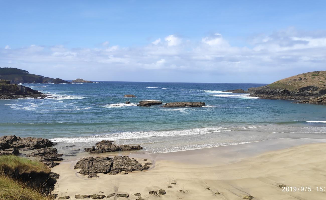 Фото Playa de Porcia с золотистый песок поверхностью