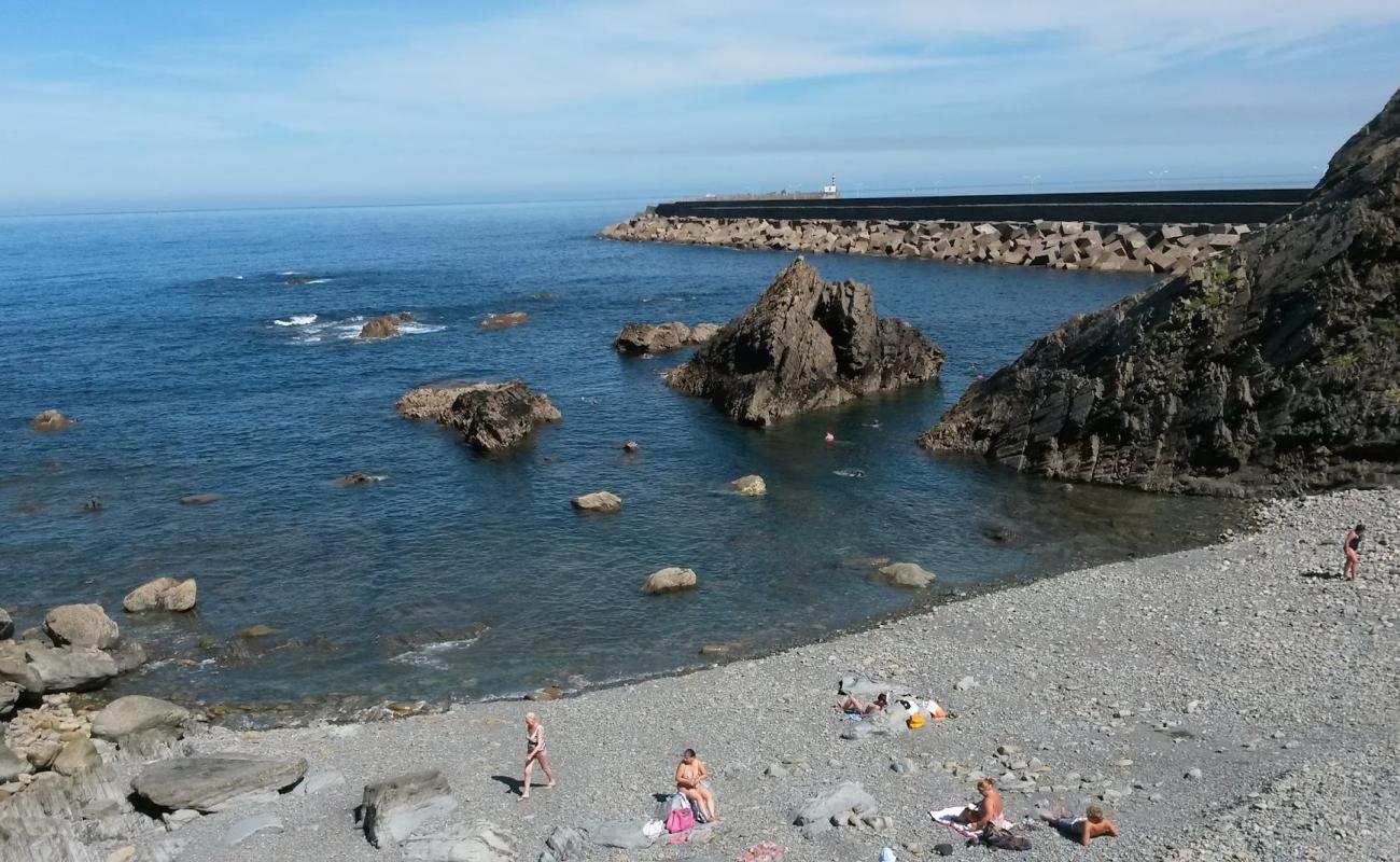 Фото Playa del Garruncho с светлая галька поверхностью