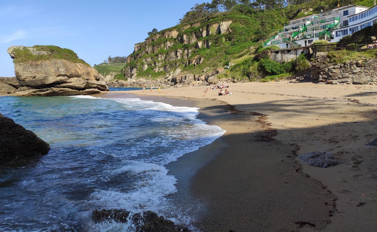 Фото Playa de Estano с белая чистая галька поверхностью