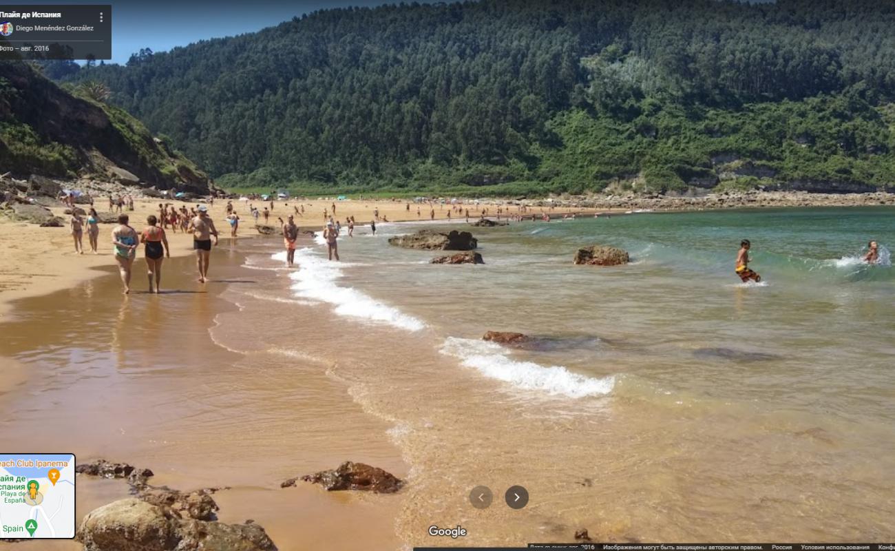 Фото Playa de Espana окруженный горами