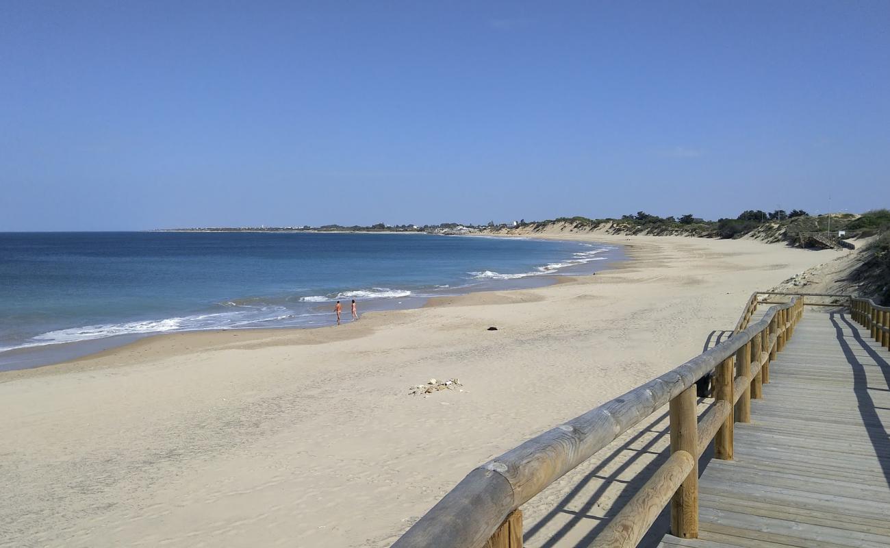 Фото Playa Rota с светлый песок поверхностью