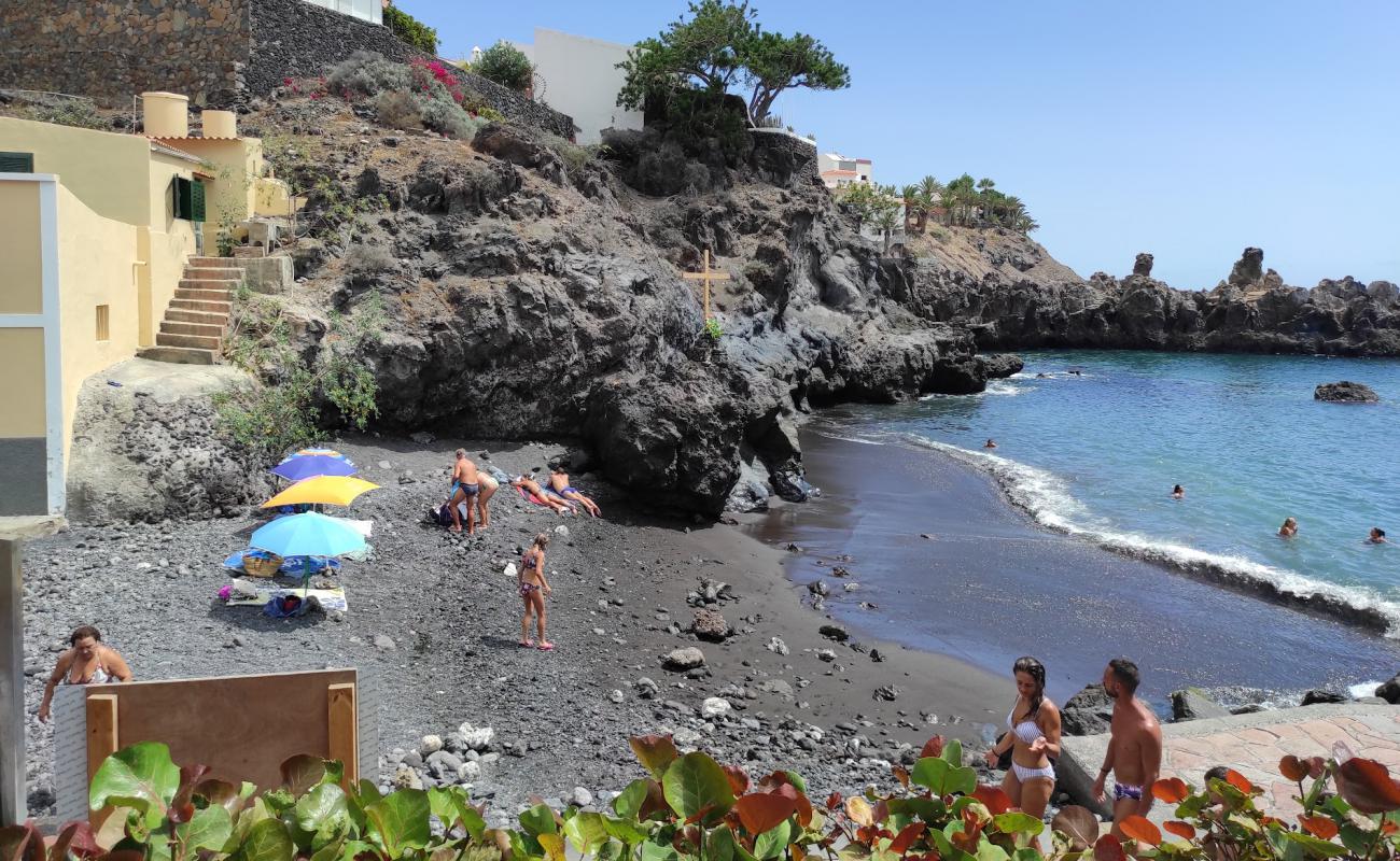 Фото Playa de Alcala с песок с камнями поверхностью