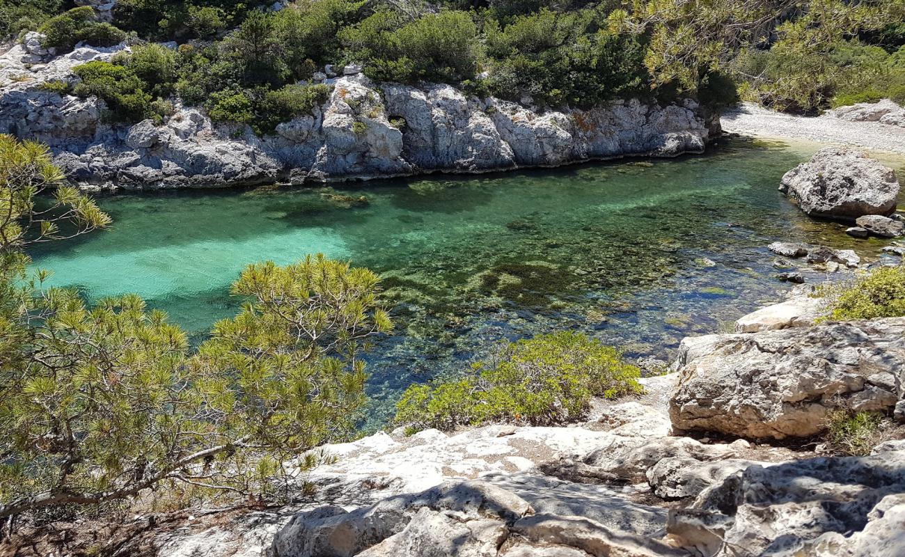 Фото Platja de Cala Figuera с светлая галька поверхностью