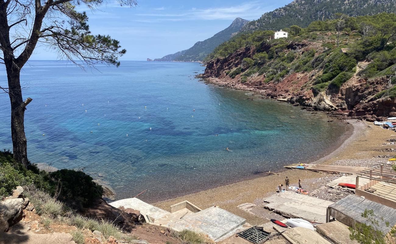 Фото Playa Puerto des Canonge с серая галька поверхностью