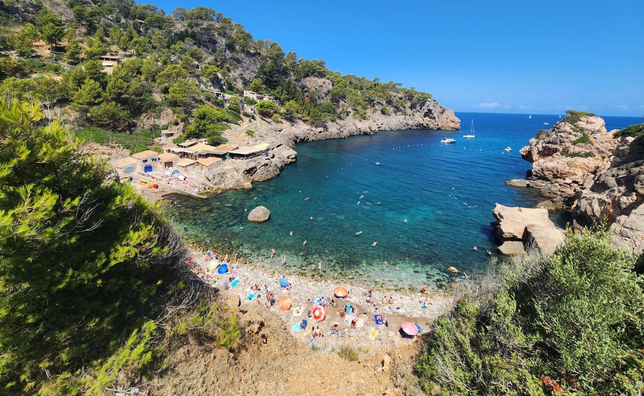 Фото Cala de Deia с камни поверхностью