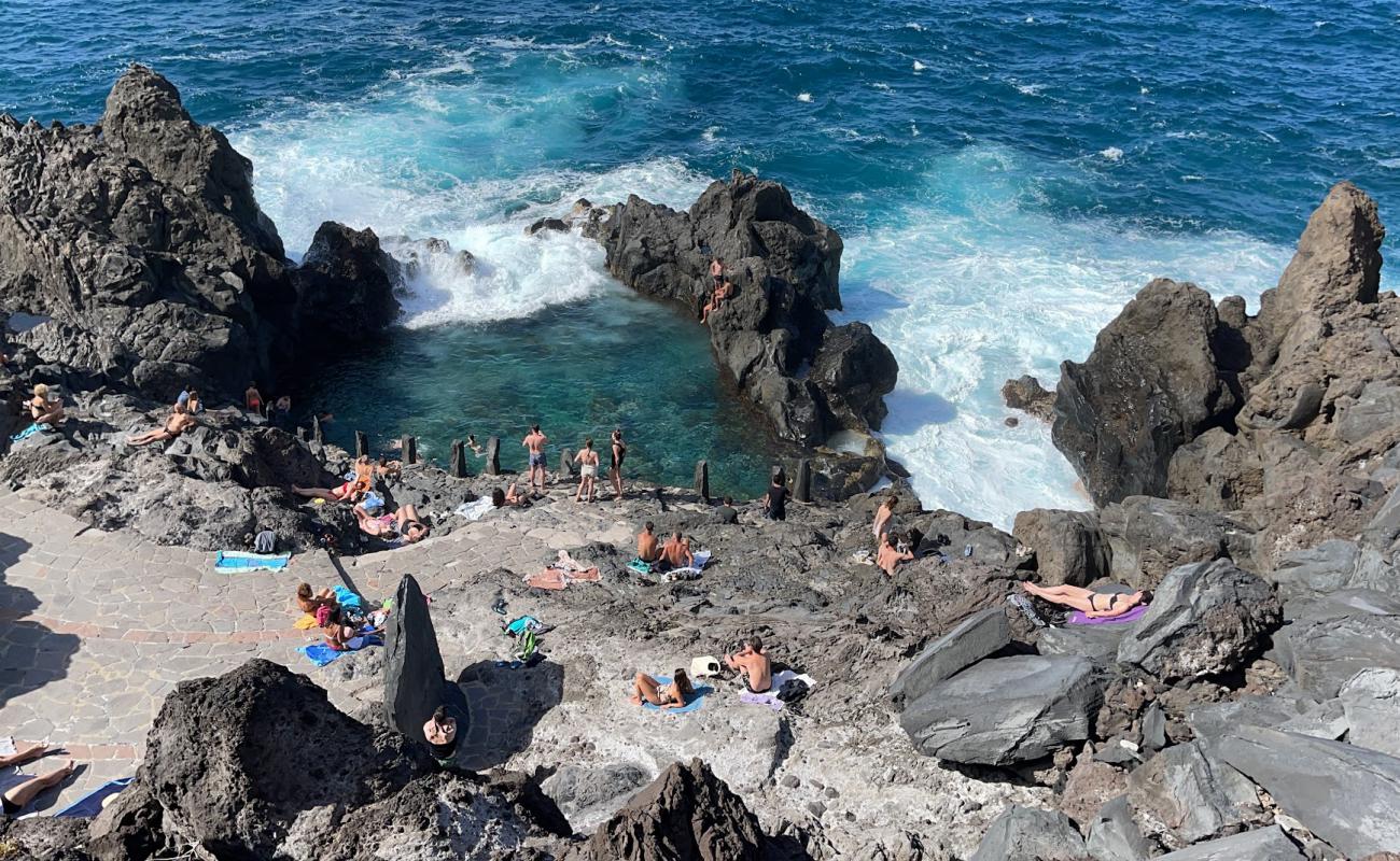 Фото Charco De La Laja Beach с камни поверхностью