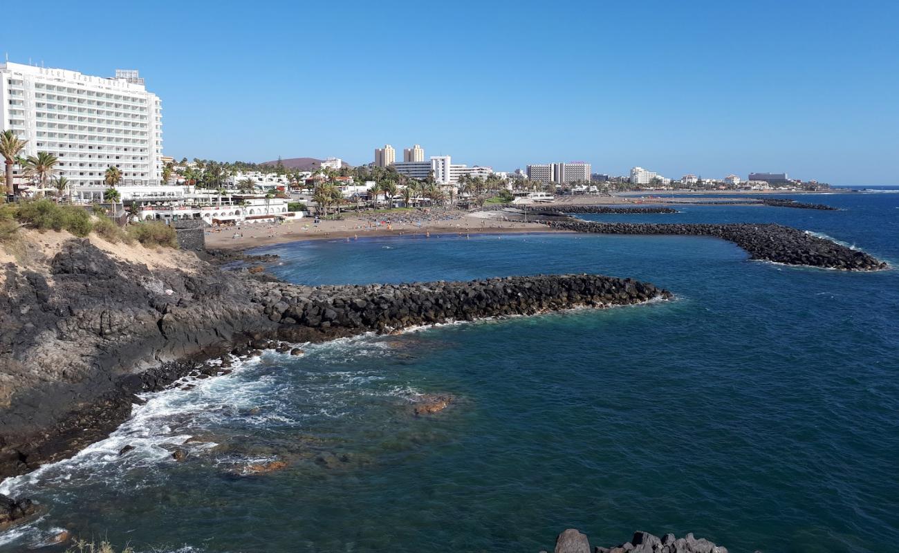 Фото Playa de El Bobo с серый песок поверхностью