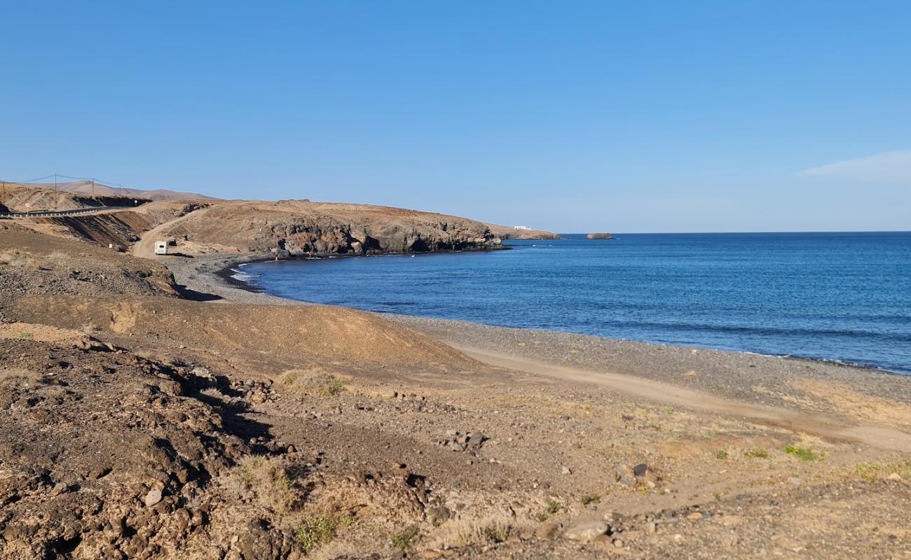 Фото Playa Laja del Corral с камни поверхностью