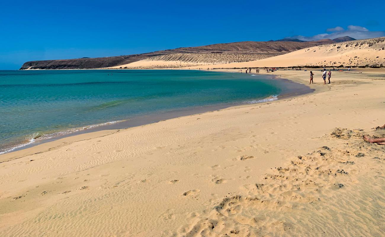 Фото Playa Risco del Paso с светлый песок поверхностью