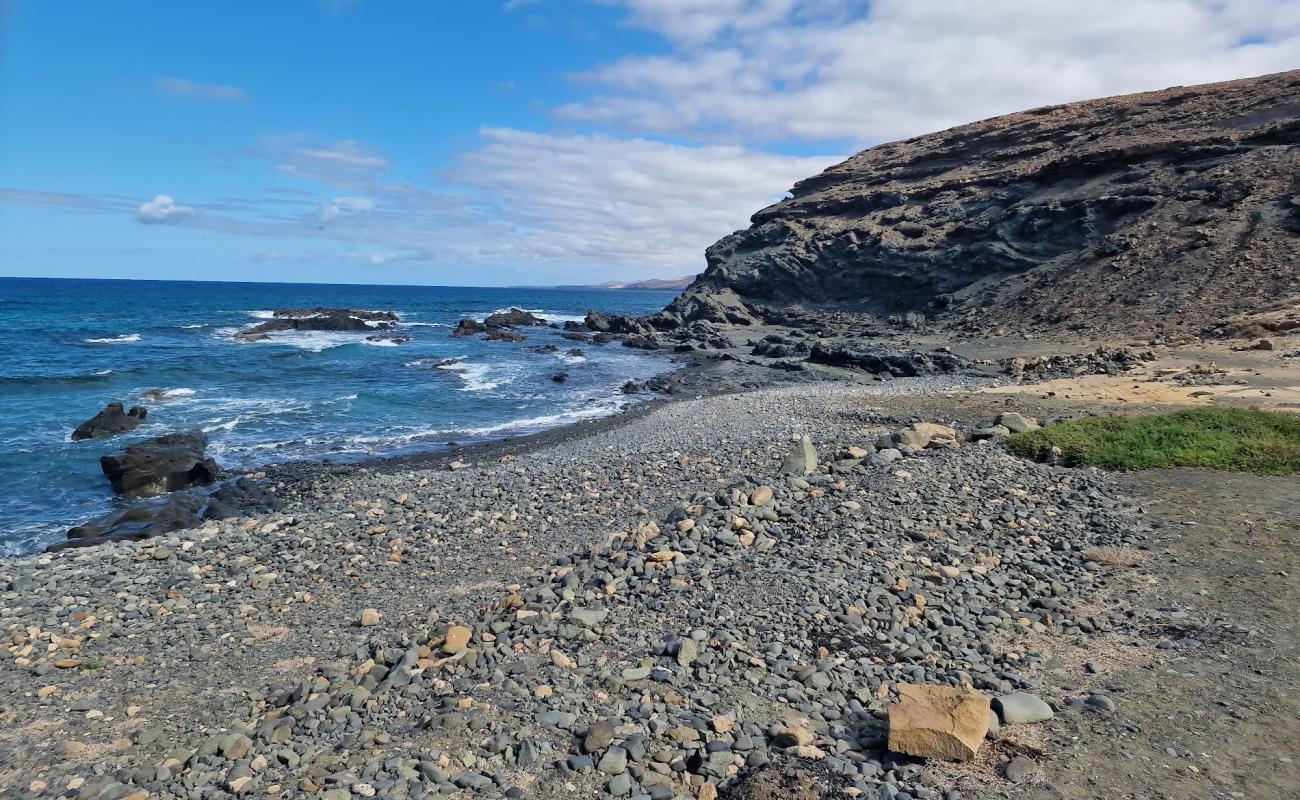 Фото Playa del Junquillo с камни поверхностью