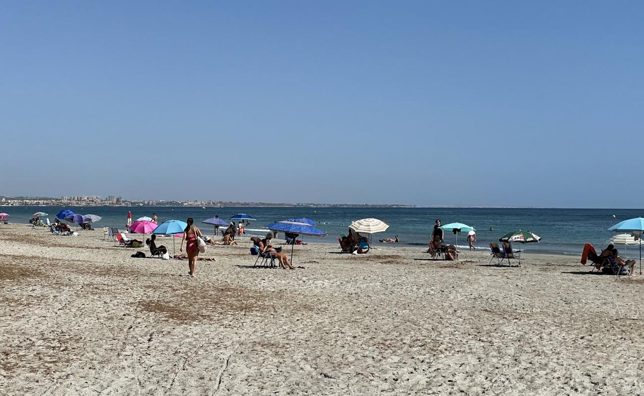 Фото Playa de la Torre Derribada с серый песок поверхностью