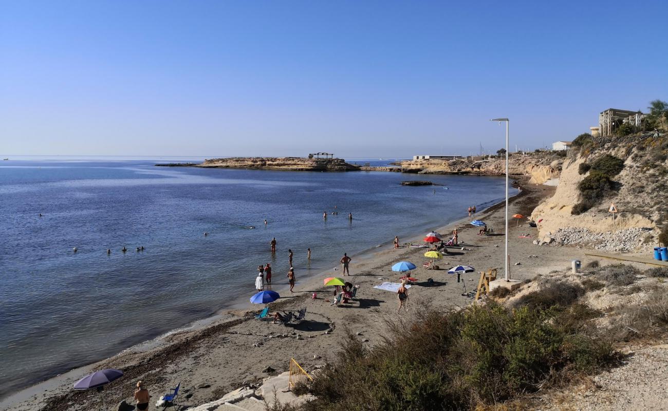 Фото Platja de l'Almadrava с светлый песок поверхностью