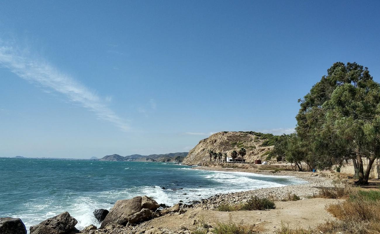 Фото Cala de les Puntes del Moro с серая галька поверхностью