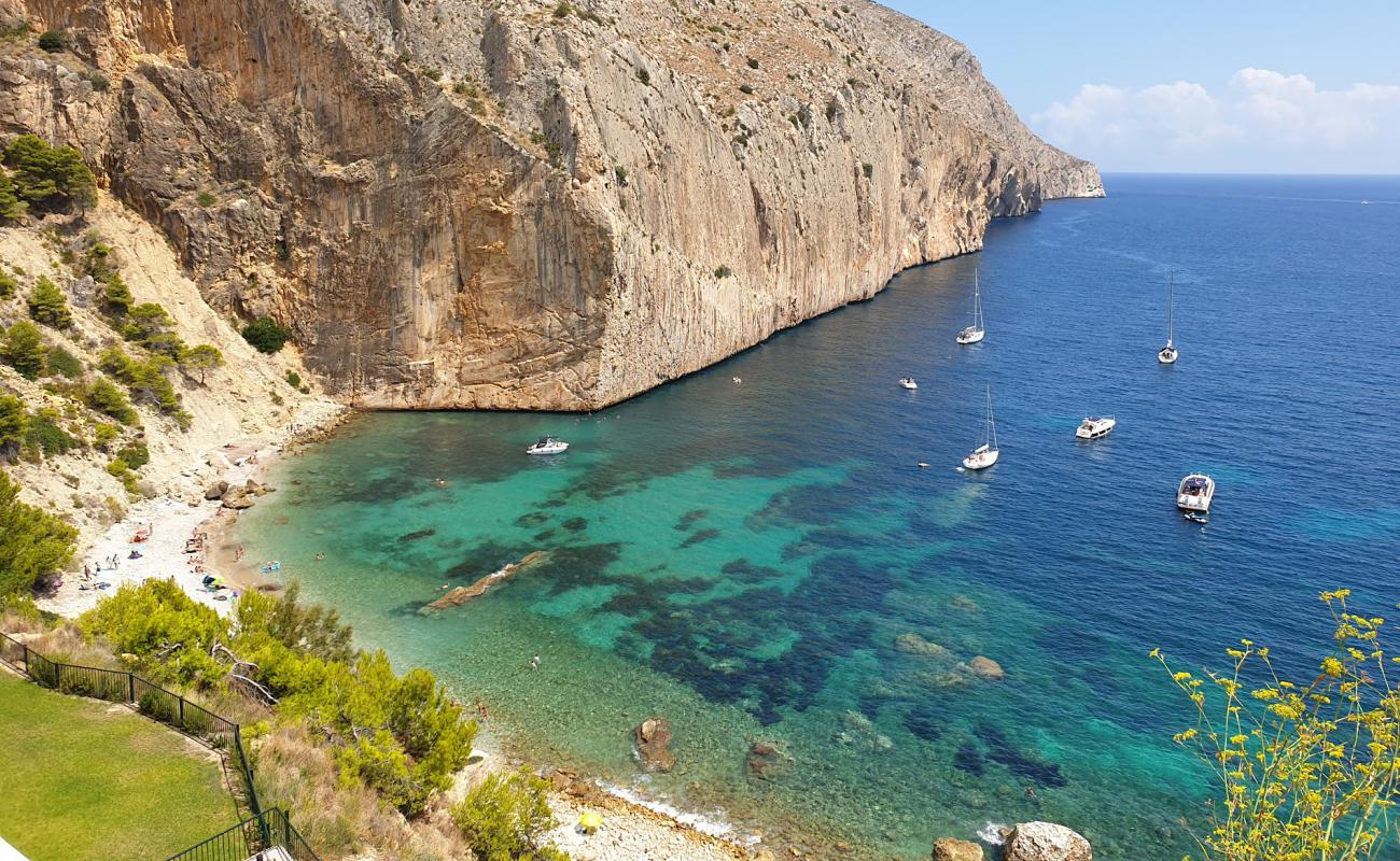 Фото Cala del Raco del Corb с светлая галька поверхностью