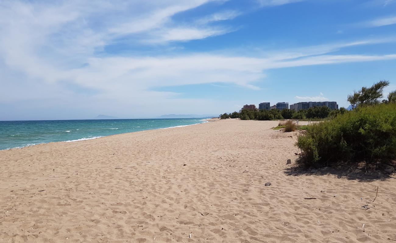 Фото Platja del Brosquil с светлый песок поверхностью