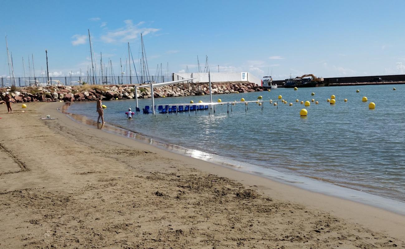 Фото Playa Pobla Marina с светлый песок поверхностью